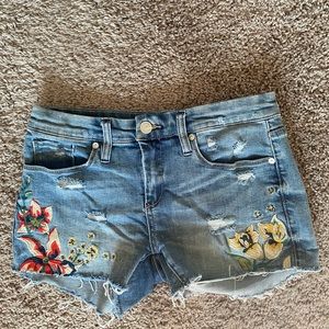 Floral embroidered jean shorts
